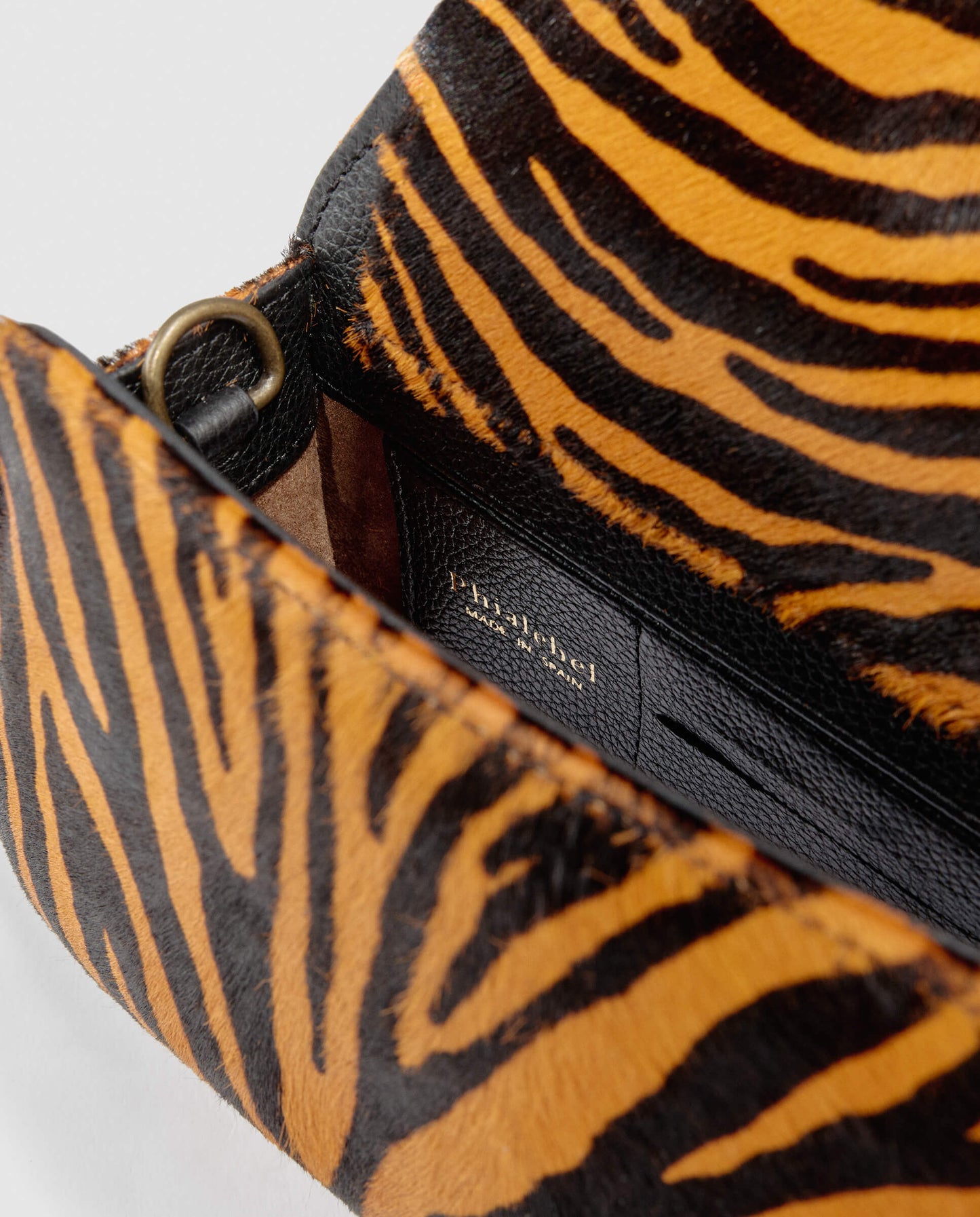 Bolso mini de pelo Phialebel en print de zebra naranja y negro