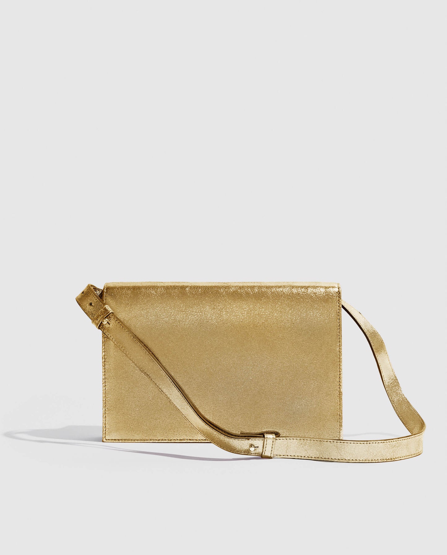 Cartera de mano Phialebel dorada. Hecho a mano en España