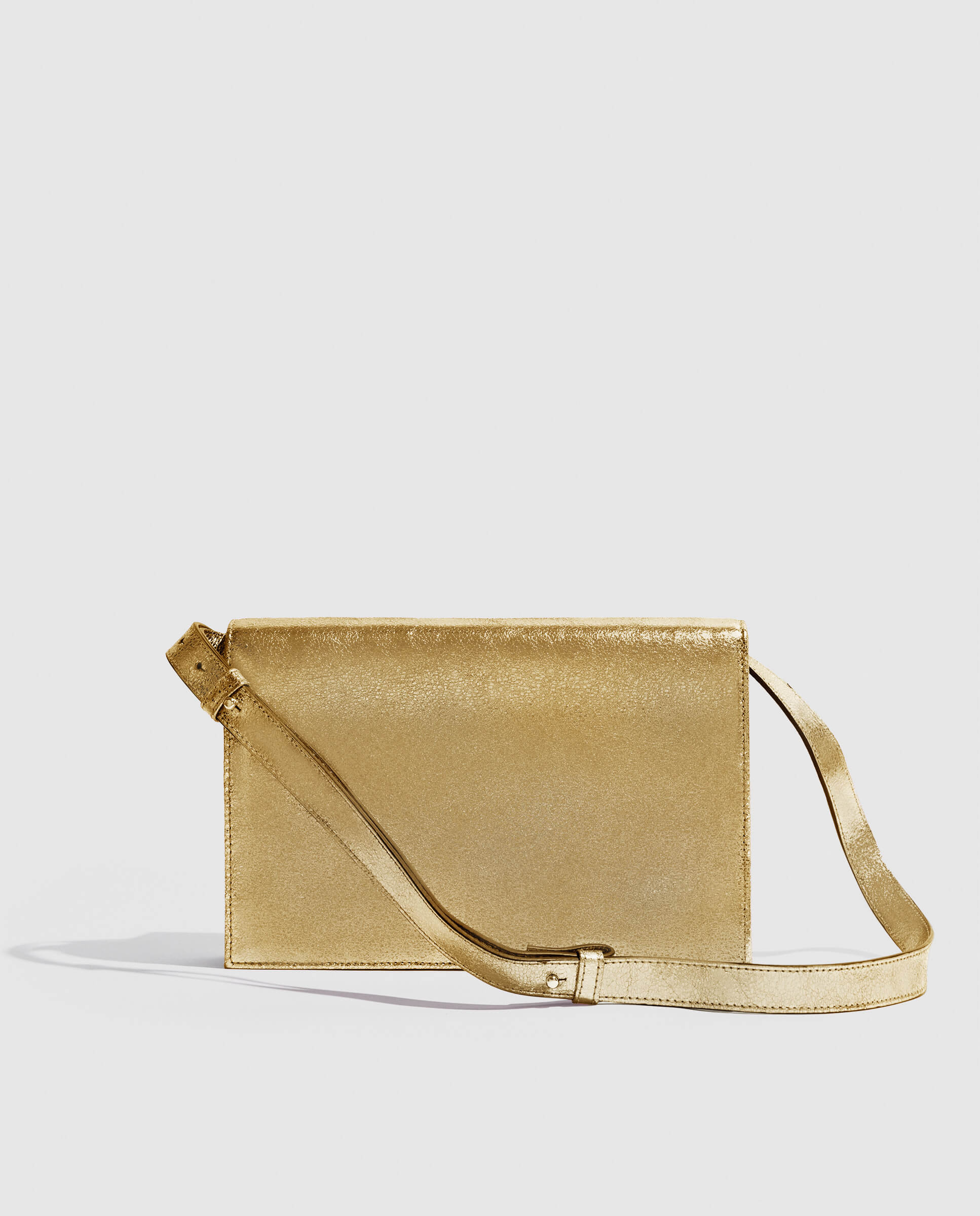 Cartera de mano Phialebel dorada. Hecho a mano en España