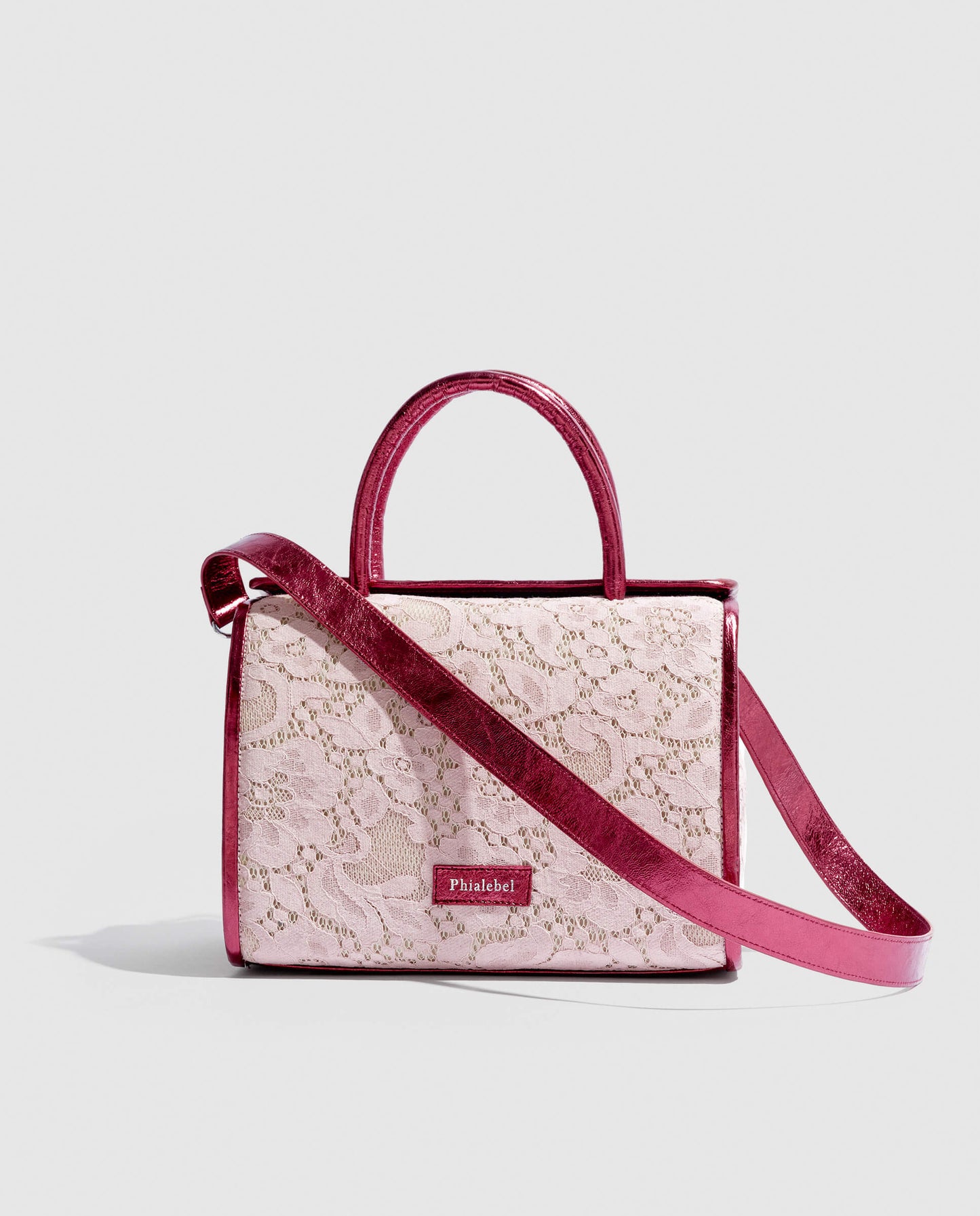 Bolso de mano de encaje rosa Phialebel