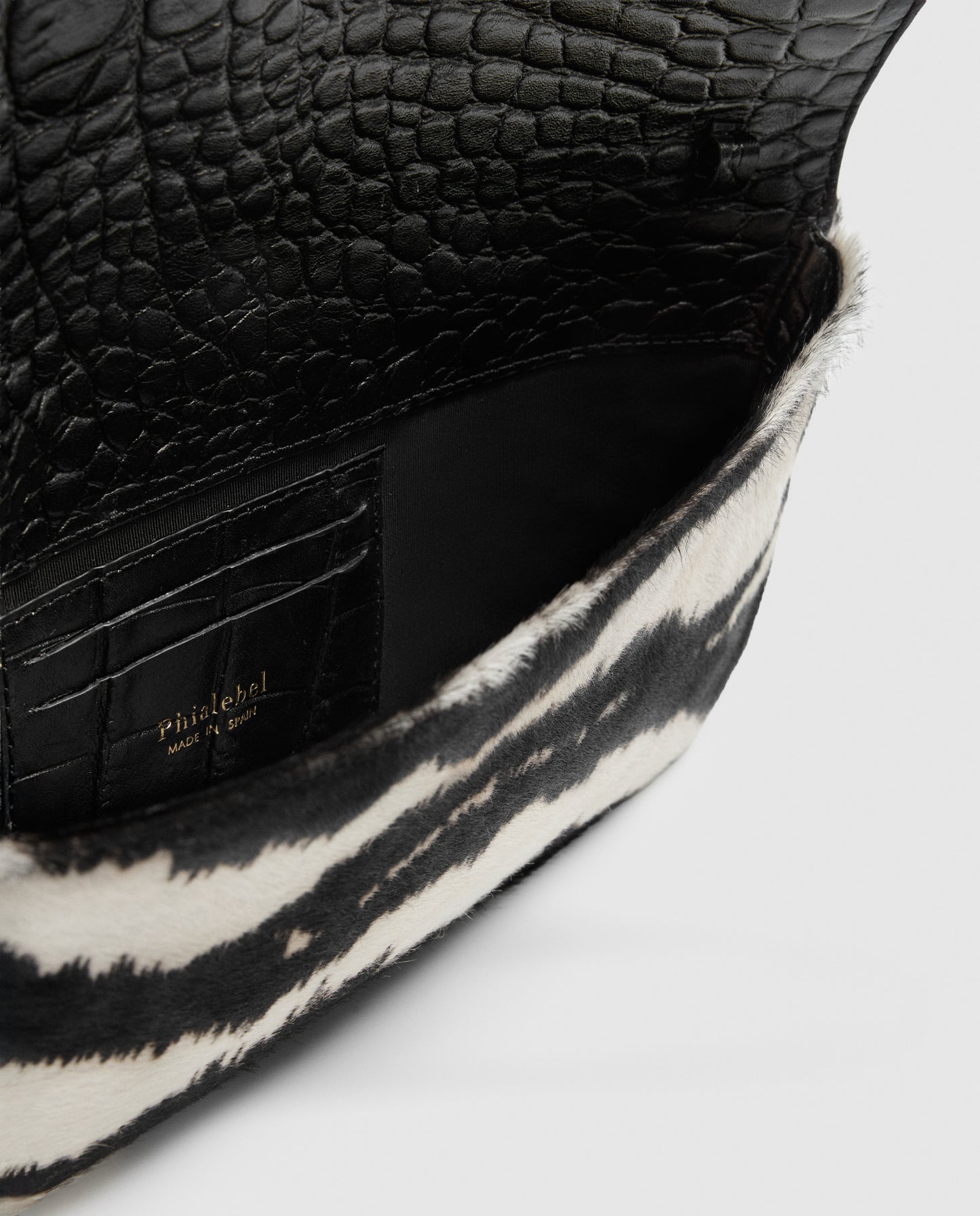 Bolso cartera de pelo vacuno con estampado de cebra