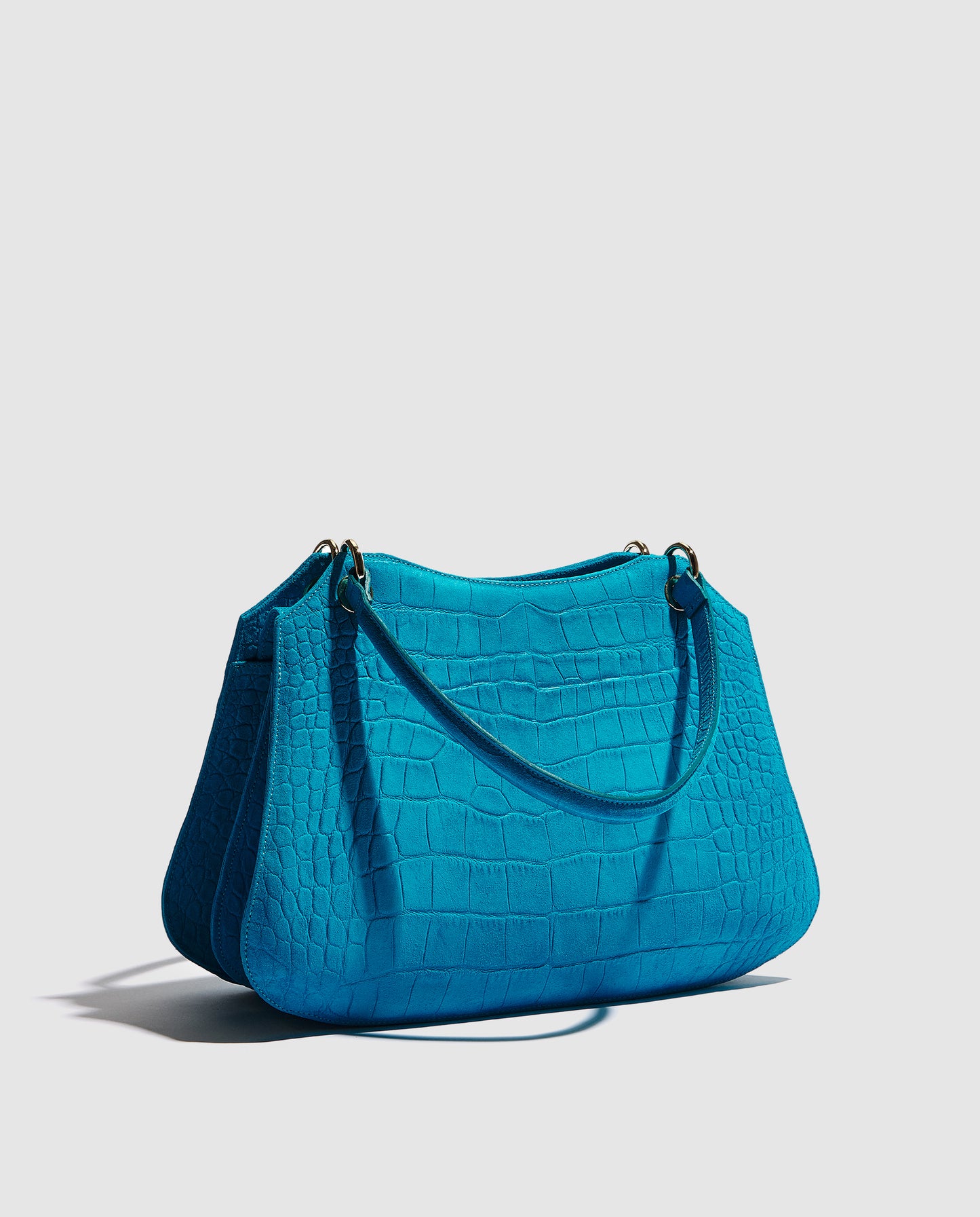 Bolso de mano efecto cocodrilo en azul turquesa