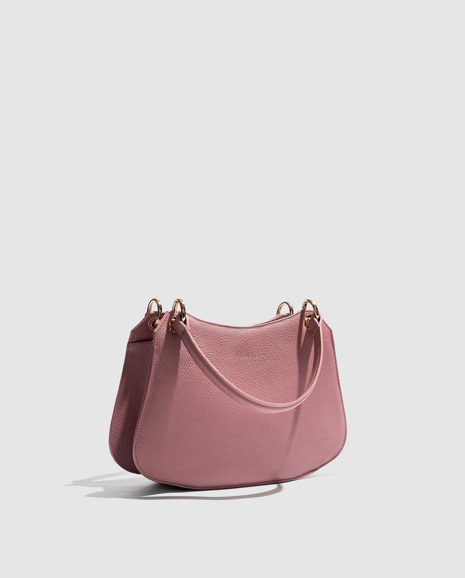 Bolso rosa con argollas doradas