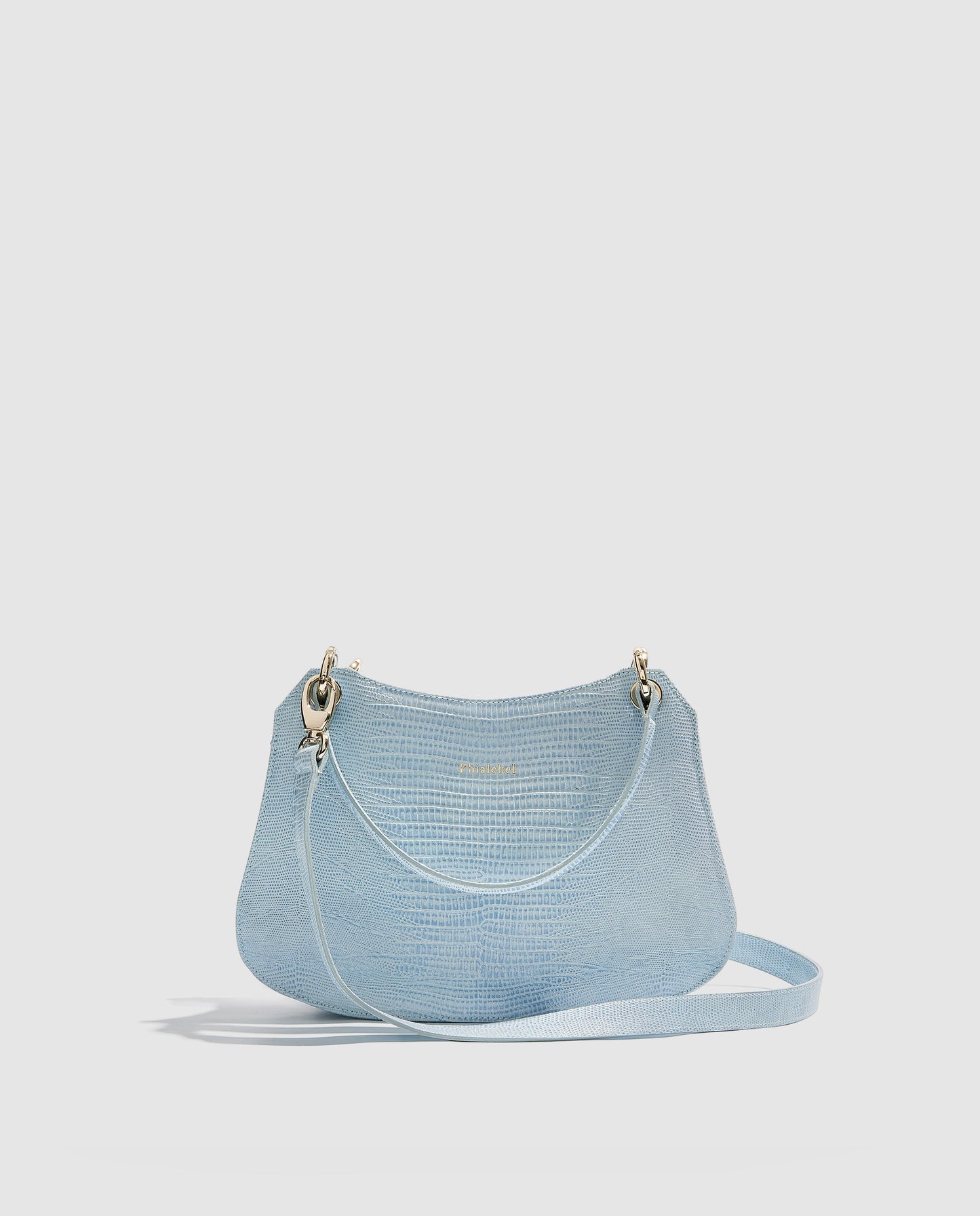Bolso de mano azul claro metalizado