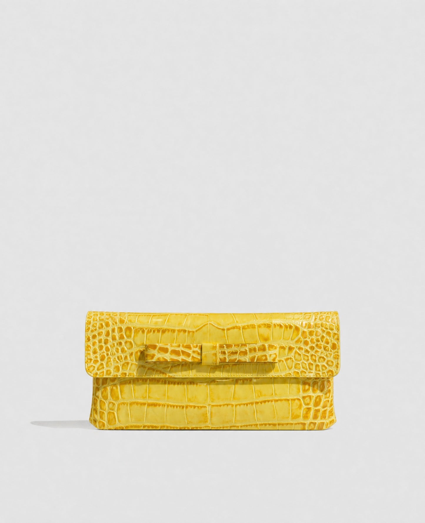 Clutch bag in black crocodile-embossed cowhide leather
