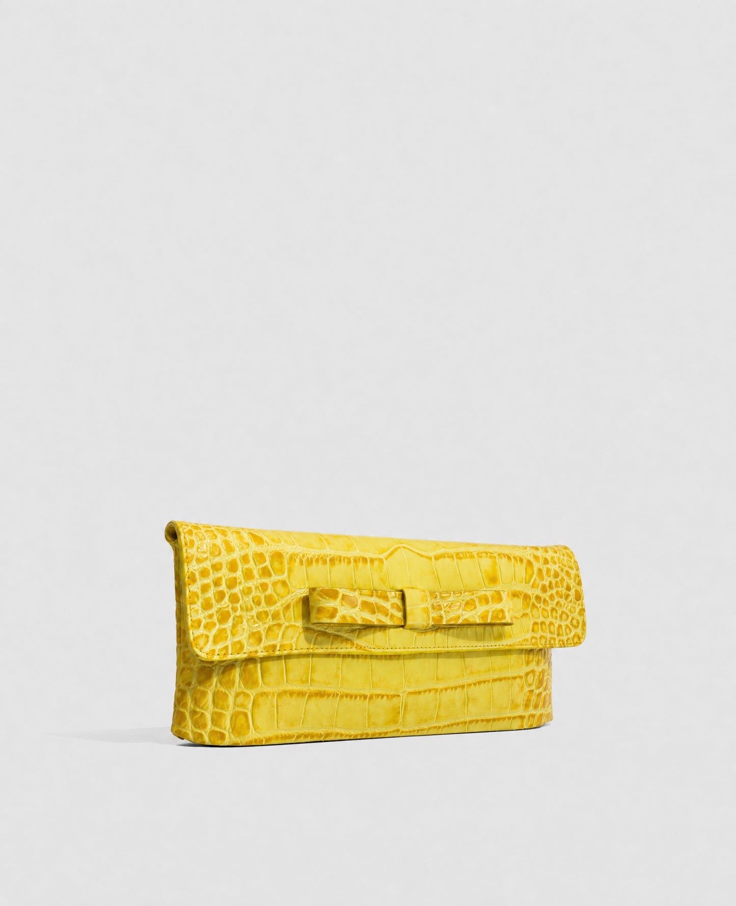 Clutch bag in black crocodile-embossed cowhide leather