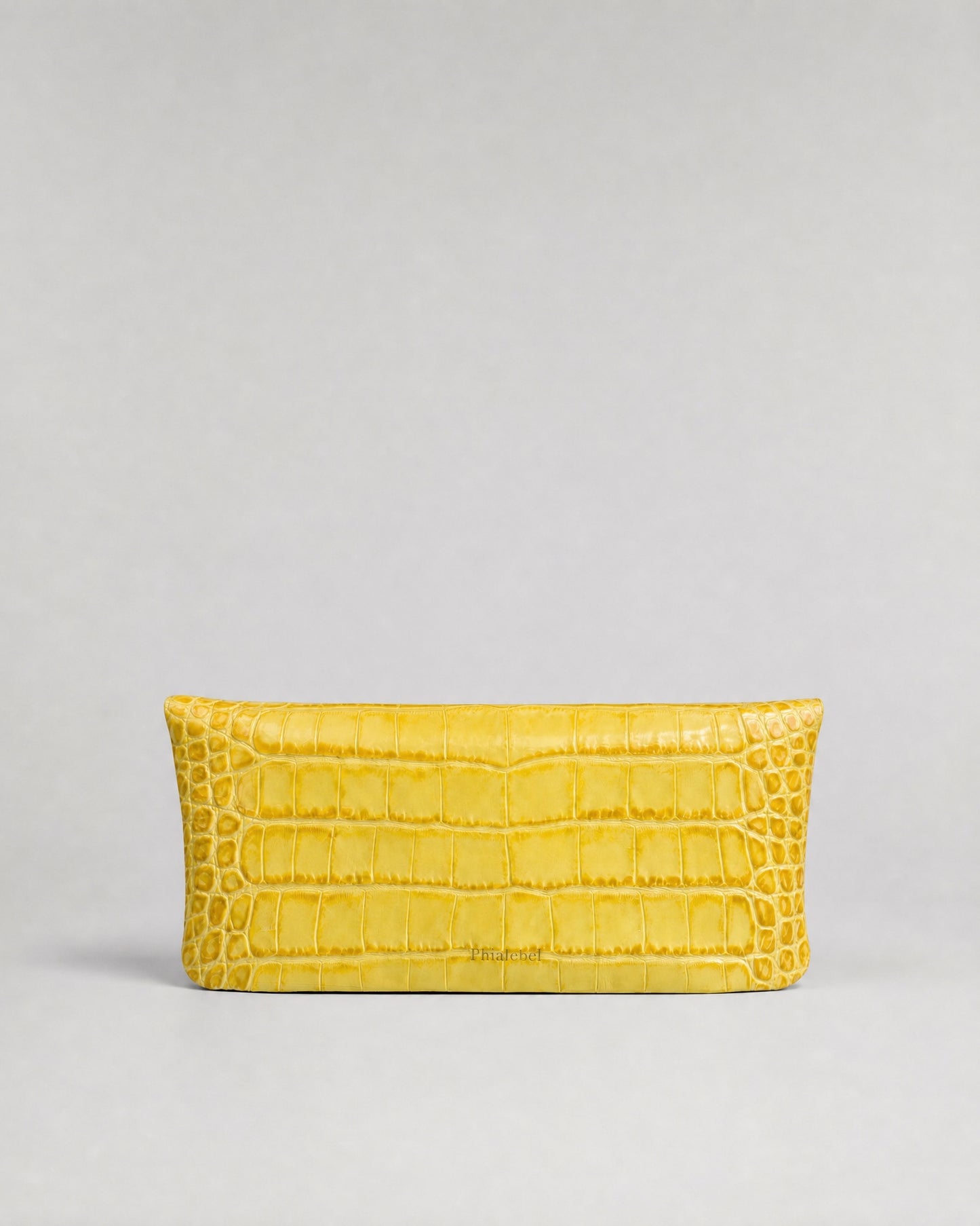 Clutch bag in black crocodile-embossed cowhide leather