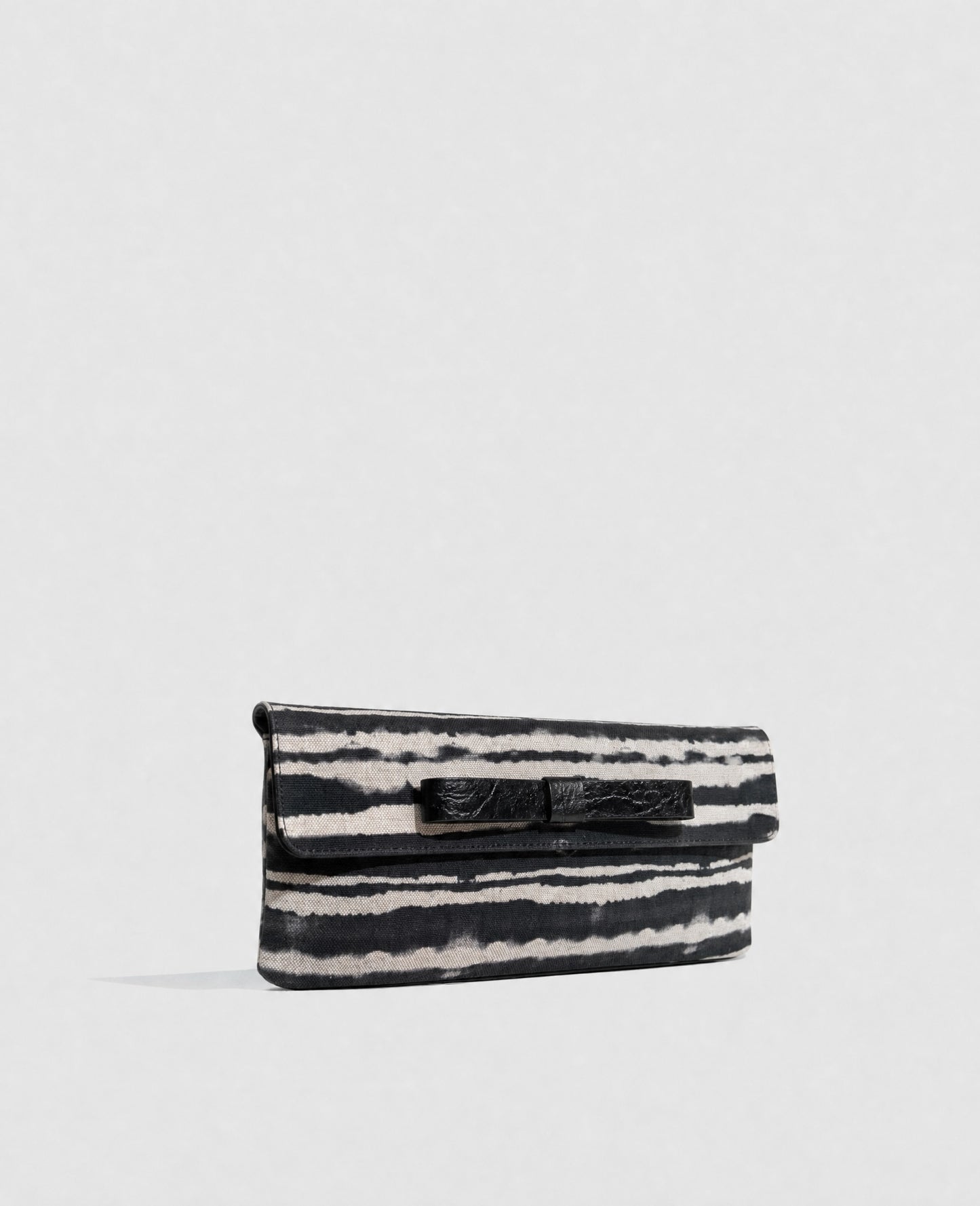 Clutch bag in black crocodile-embossed cowhide leather