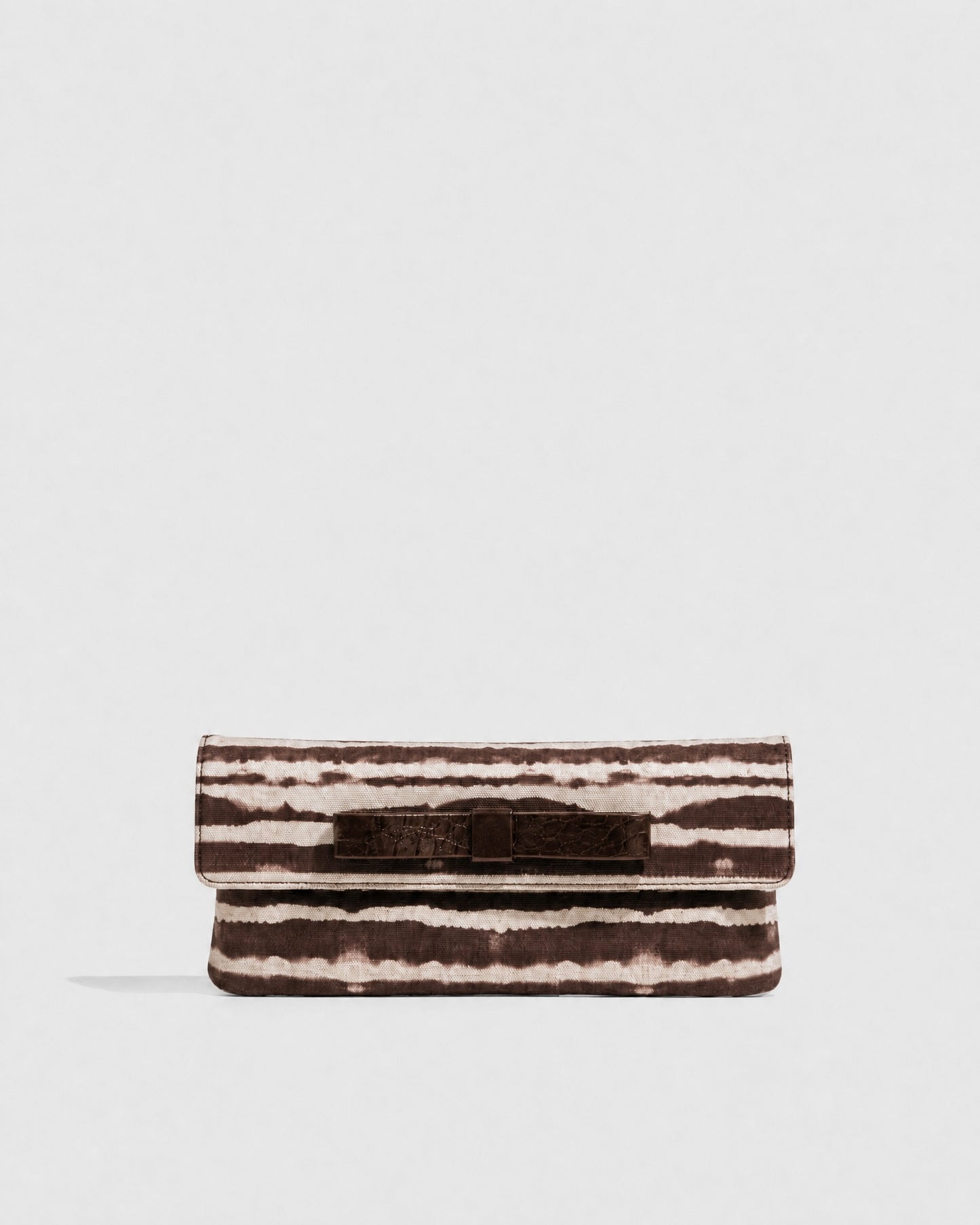 Clutch bag in black crocodile-embossed cowhide leather
