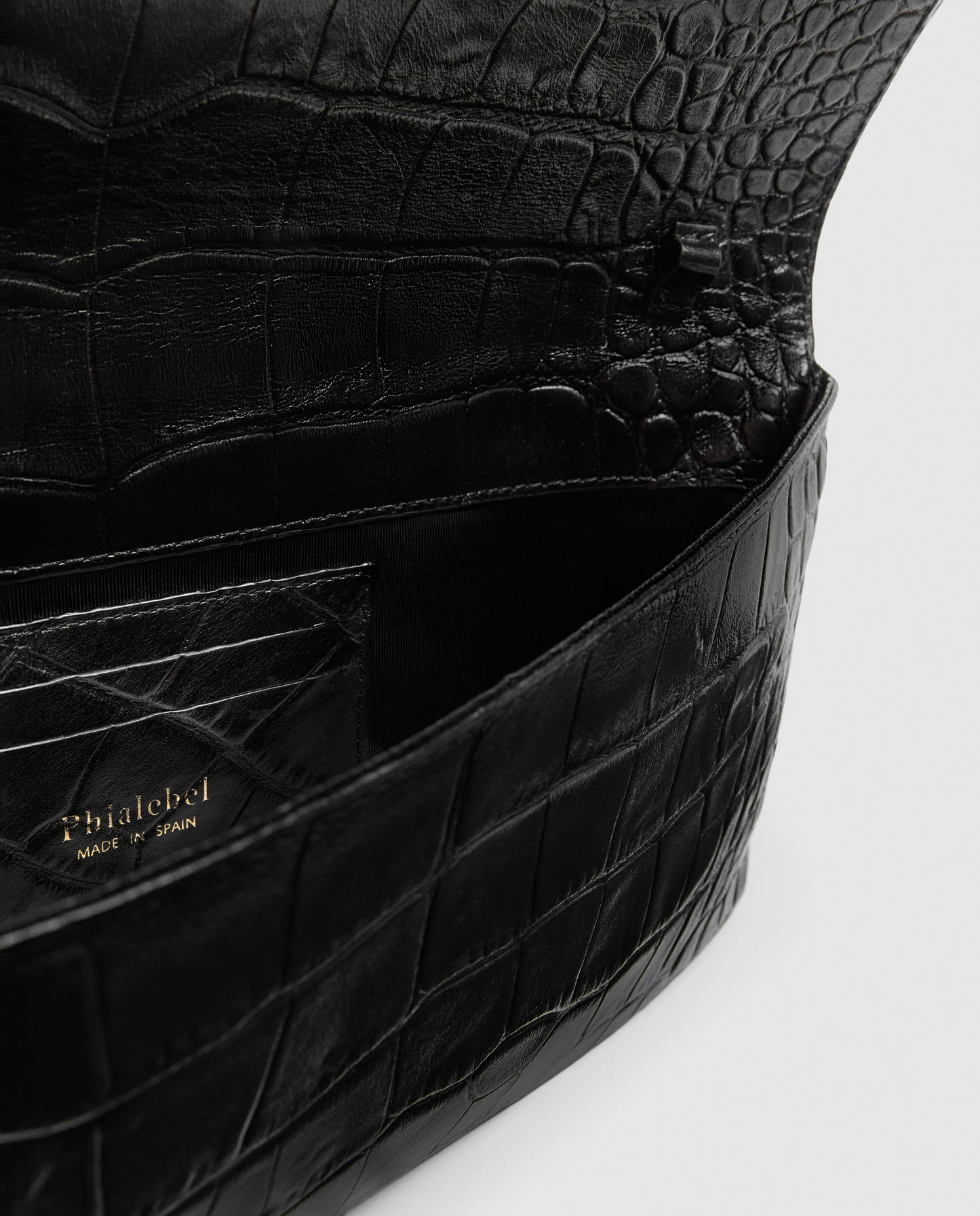 Bolso cartera de piel de vacuno con estampado de coco negro