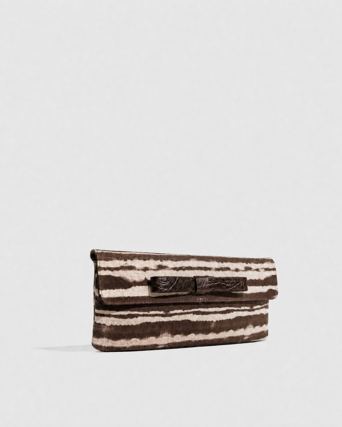 Clutch bag in black crocodile-embossed cowhide leather